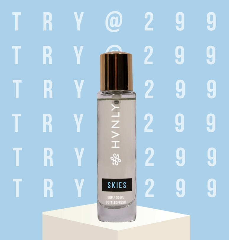 HVNLY's Skies perfume bottle on a light blue background with text - "TRY @ 299".