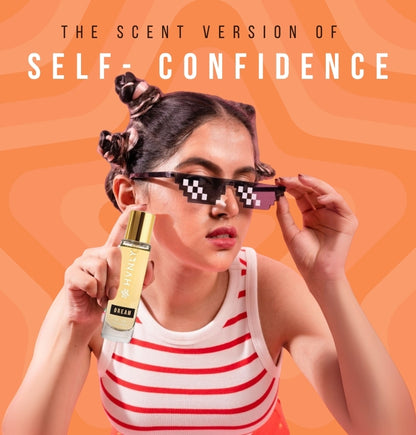 Person holding a bottle of perfume with 'The Scent Version of Self-Confidence' on an orange background