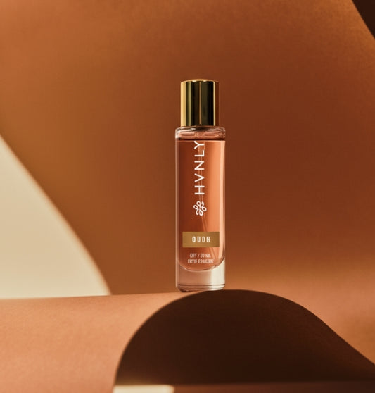 HVNLY's Oudh perfume bottle on a brown background