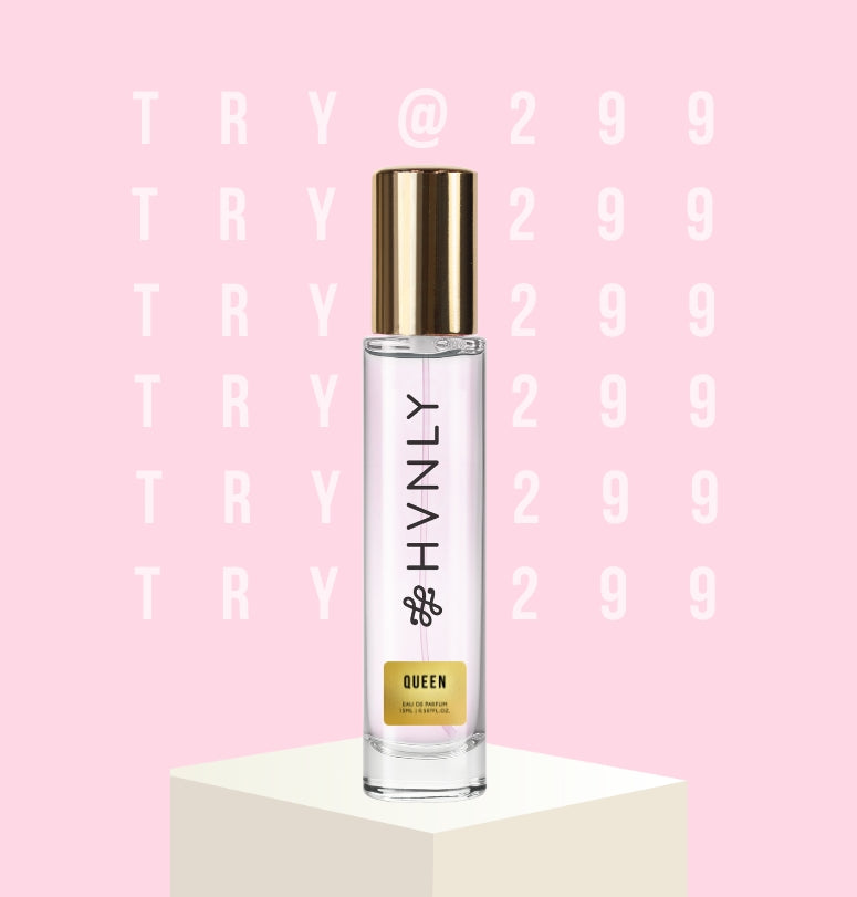 Perfume bottle labeled 'HVNLY Queen' on a pink background with text- "Try @ 299"