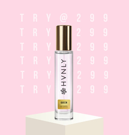 Perfume bottle labeled 'HVNLY Queen' on a pink background with text- "Try @ 299"