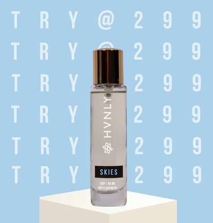 HVNLY's Skies perfume bottle on a light blue background with text - "TRY @ 299".
