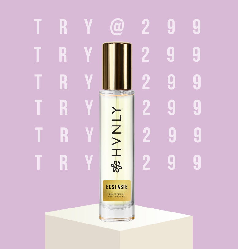 Perfume bottle labeled 'HVNLY Esctasie' on a purple background with 'TRY @ 299' text.