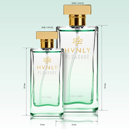 Two Hvnly Pleasure perfume bottles with gold caps on a light blue background