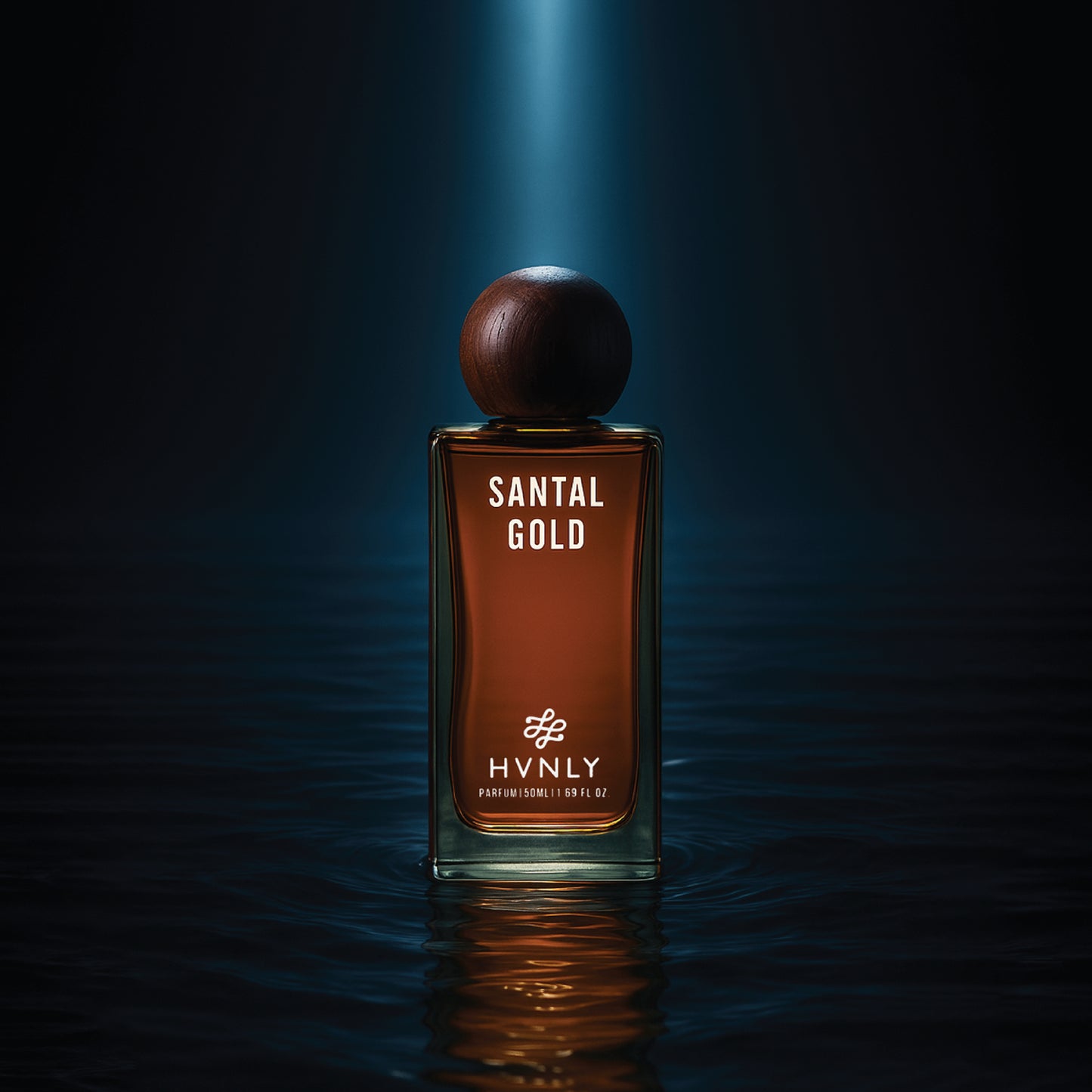Perfume bottle labeled 'Santal Gold' by Hvnly on a dark background showcasing its capability to stand out and steal the limelight