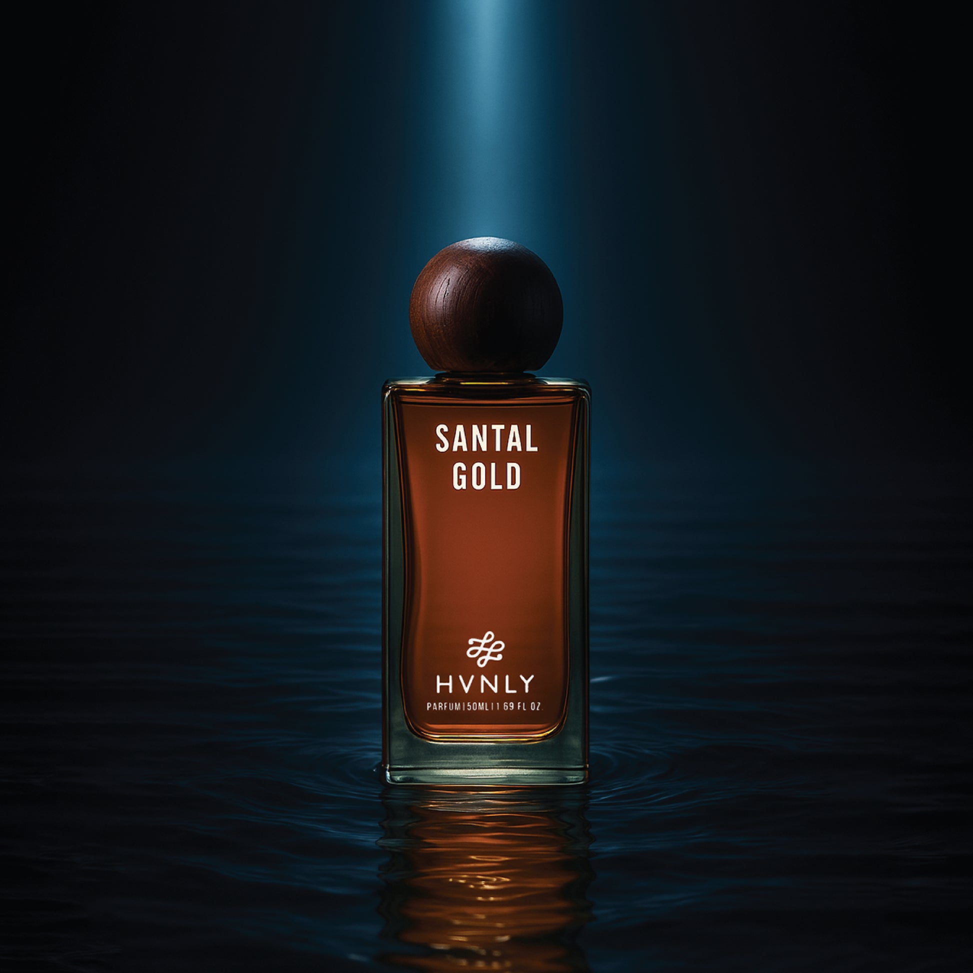 Perfume bottle labeled 'Santal Gold' by Hvnly on a dark background showcasing its capability to stand out and steal the limelight