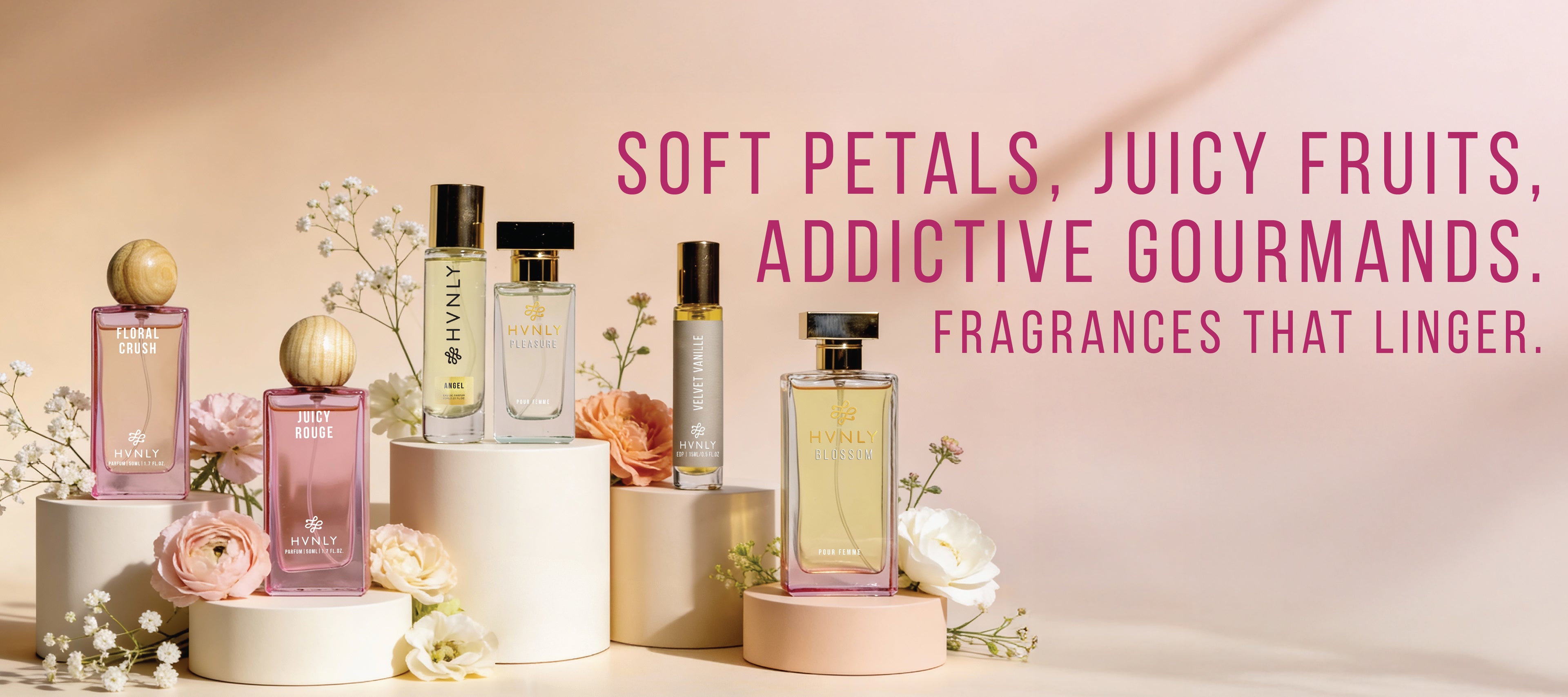 HVNLY's Perfume For Her collection bottles with flowers on a pink background and text about fragrances.