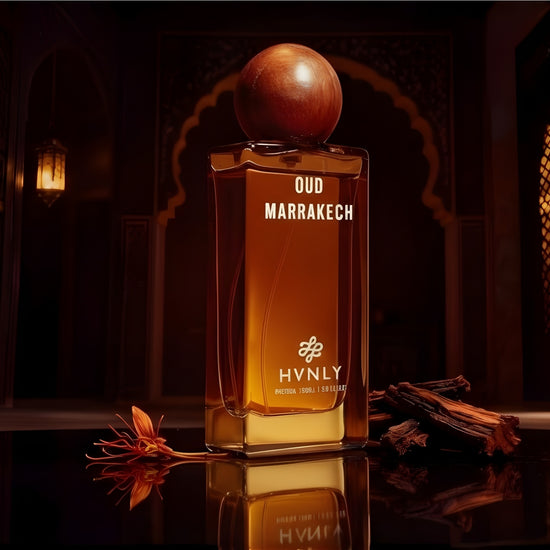 Slide shot of the Oud Marrakech perfume bottle showcasing the top, middle and base notes of the perfume.
