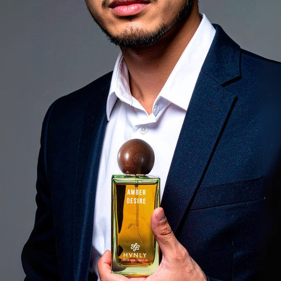 Close up shot of Amber Desire by Hvnly, showcasing the aesthetics, sleek design and state of the art design of the bottle.