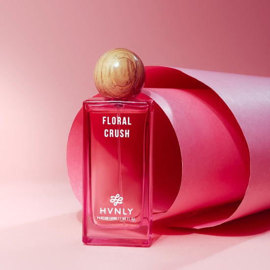 Sliding shot of Floral Crsuh perfume by Hvnly showing the top, middle and base notes of the perfume