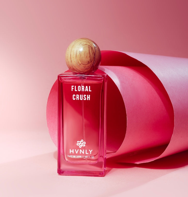 Sliding shot of Floral Crsuh perfume by Hvnly showing the top, middle and base notes of the perfume
