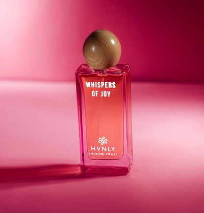 Sliding shot of Whispers of Joy perfume by Hvnly, showcasing the top, middle and base notes of the perfume in the next frame.