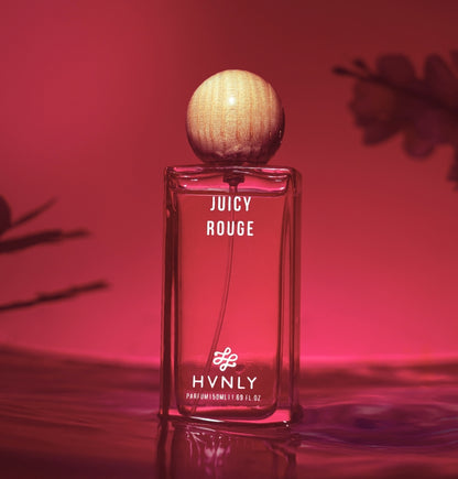Sliding shot of Juicy Rouge perfume by Hvnly showing the top, middle and base notes of the perfume in the second shot of the video.