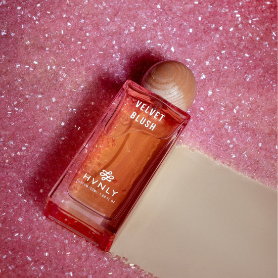 Sliding shot of Velvet Blush perfume by Hvnly, showcasing the top, middle and base notes of the perfume in the next frame.