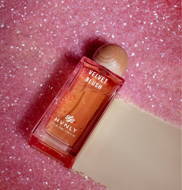 Sliding shot of Velvet Blush perfume by Hvnly, showcasing the top, middle and base notes of the perfume in the next frame.
