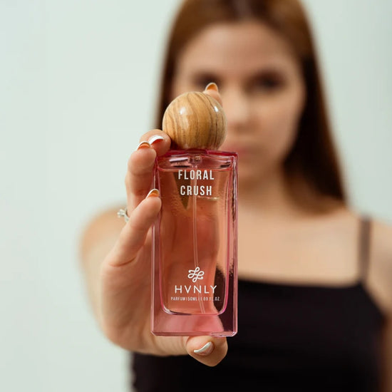 Close up shot of the perfume bottle showing its sleek, state of the art design and aesthetics.