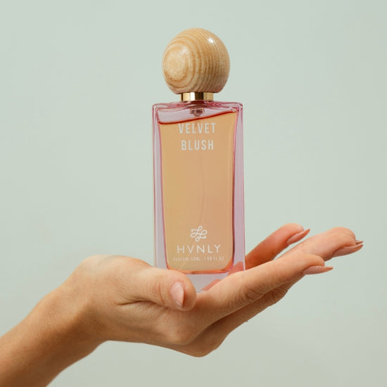 Close up shot of the bottle showcasing the detailing aesthetics of velvet blush bottled by Hvnly.