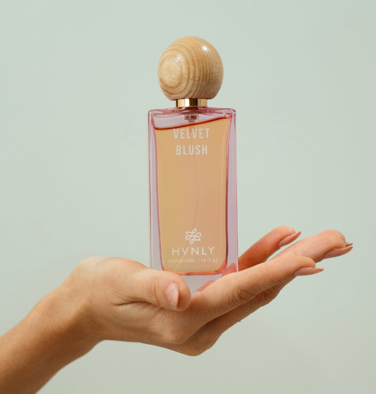 Close up shot of the bottle showcasing the detailing aesthetics of velvet blush bottled by Hvnly.