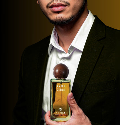 Sliding shot of Amber Desire perfume by Hvnly showcasing the top, middle and base notes of the perfume in the next frame.