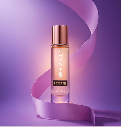 Perfume bottle 'HVNLY's Ecstasie' branding on a purple background showcasing the aesthetics of the bottle
