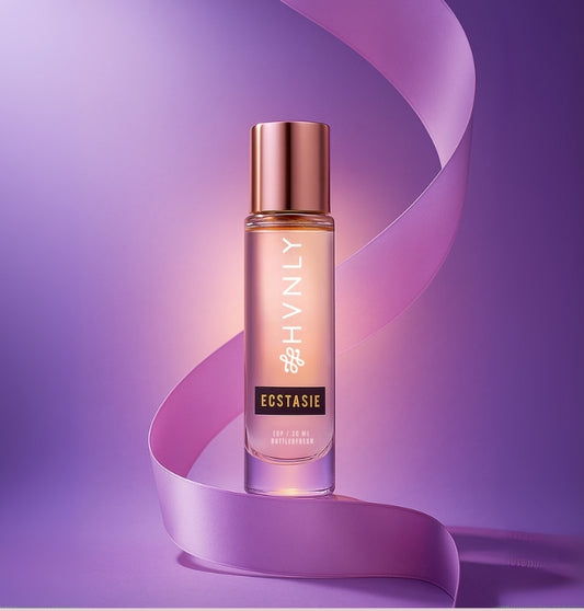 Perfume bottle 'HVNLY's Ecstasie' branding on a purple background showcasing the aesthetics of the bottle